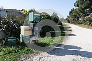 Row of metal and plastic several mailboxes on the side along the road