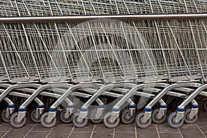 Row of Metal Shopping Carts