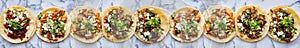 Row of mexican street tacos with carne asada and al pastor in corn tortilla wide banner composition photo