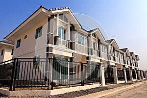 A row of new and colorful townhouses