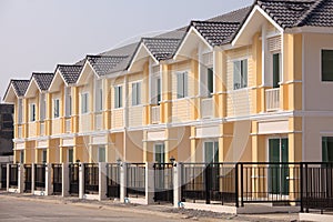 A row of new and colorful townhouses