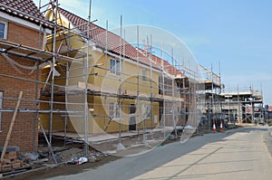 Row of new houses under construction