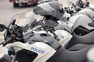 Row of new police motorbikes on the street