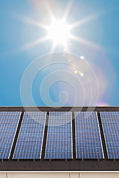 Row of new solar panels on a roof of a Duth house