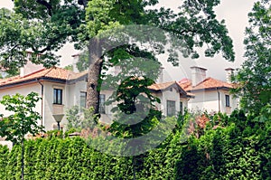 Row of new townhouses or condominiums. Modern suburban townhouses in residential neighbourhood