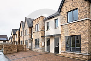 Row of newly built houses for sale