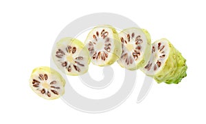 Row of Noni fruit sliced photo