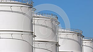 Row of oil storage tanks