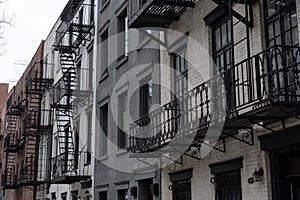 Row of Old Buildings with Fire Escapes in Kips Bay New York City photo