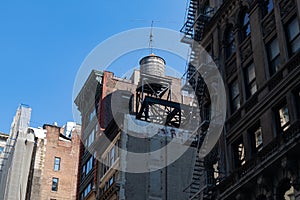 Row of Old Buildings with an Old Water Tower in Gramercy Park of New York City photo