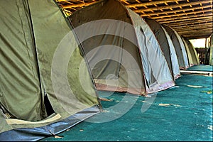Row of old camping tents