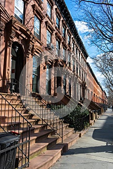 A Row of Old Colorful Brownstone Townhouses in Fort Greene Brooklyn New York