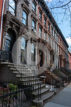 A Row of Old Colorful Brownstone Townhouses in Fort Greene Brooklyn New York