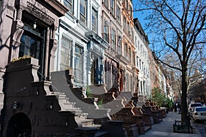 A Row of Old Colorful Brownstone Townhouses on the Upper West Side of New York City