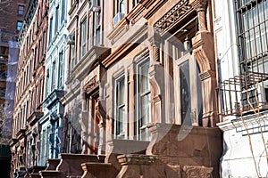 A Row of Old Colorful Brownstone Townhouses on the Upper West Side of New York City