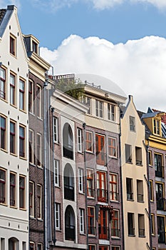 Row of old and modern canal houses in Amsterdam