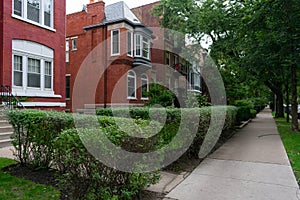 Row of Old Red Brick Homes and the Sidewalk in Lincoln Park Chicago