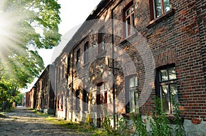 A row of old red brick houses at Ksiezy Mlyn in Lodz