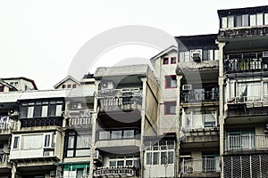 A row of old townhouse, old crowded vintage residential tenement house building in Taipei, Taiwan