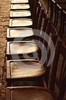 Row of Old Wooden Chairs