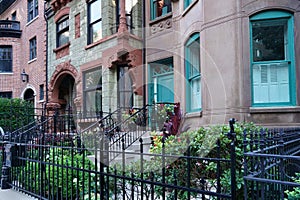 Row of ornate old 19th century townhouses