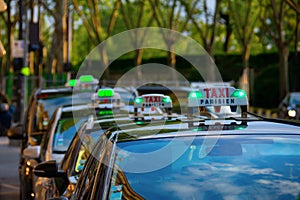 Row of Parisien taxis in the Republique District of Paris France