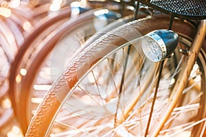 Row of parked vintage bicycles bikes for rent on