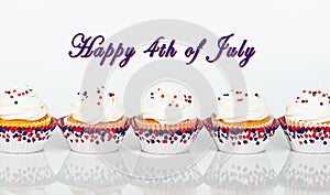 Row of patriotic Fourth of July celebration cupcakes