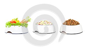 Row of 3 pet food bowls photo