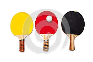 Row of ping pong paddles on white
