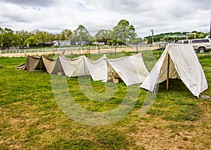 Row Of Pitched Canvas Tents In A Row