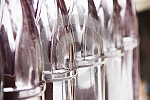 Row of plastic bottles.Home brewed wine in plastic bottles.Bottles close up