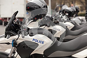 Row of new police motorbikes on the street