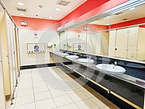 Row of public toilet, restroom, lavatory, water closet and white ceramic