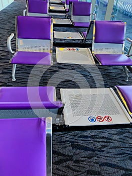 Row of purple chair at airport