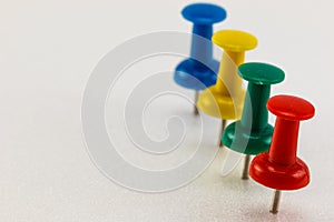 Row of push pins