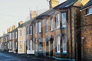 A row of red brick terrace houses in Kent, UK