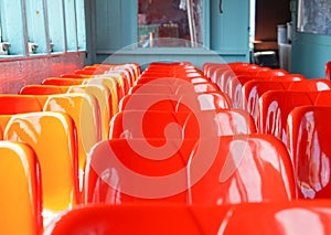 Row of red plastic seat