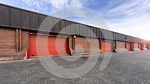 Row of red storage warehouse facility