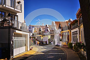 Row of residential houses in the traditional German architecture style. View of a street with colorful buildings. WarnemÃÂ¼nde