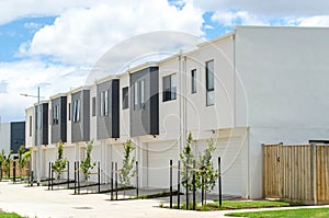 A row of residential townhomes or townhouses in Melbourne`s suburb, VIC Australia. Concept of real estate development