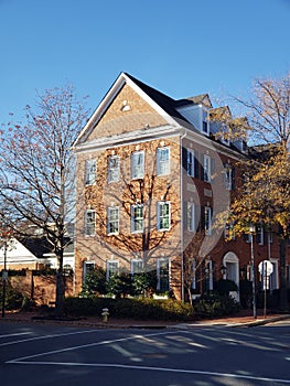 row of residential townhouses. Concept of real estate development, the housing market, and homeownership