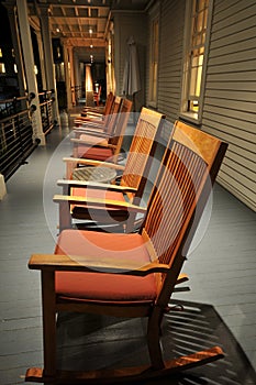 Row of rocking chairs on porch
