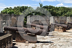 A row of rusting cannons at Ozama Fortress photo