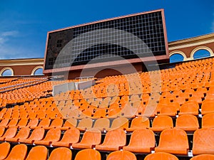 Row of seats and score board