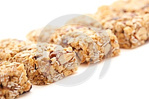 Row of Several Granola Bars Isolated on White