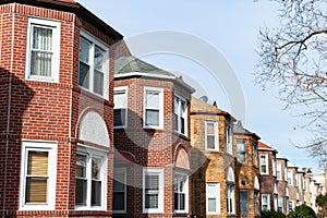 Row of Similar Old Brick Homes in Astoria Queens New York photo