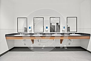 A row of sinks in a public restroom