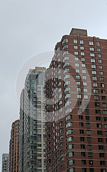 A Row of Skyscrapers in Chelsea New York City on an Overcast Day