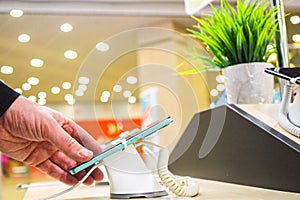 Row of smartphones on a store showcase
